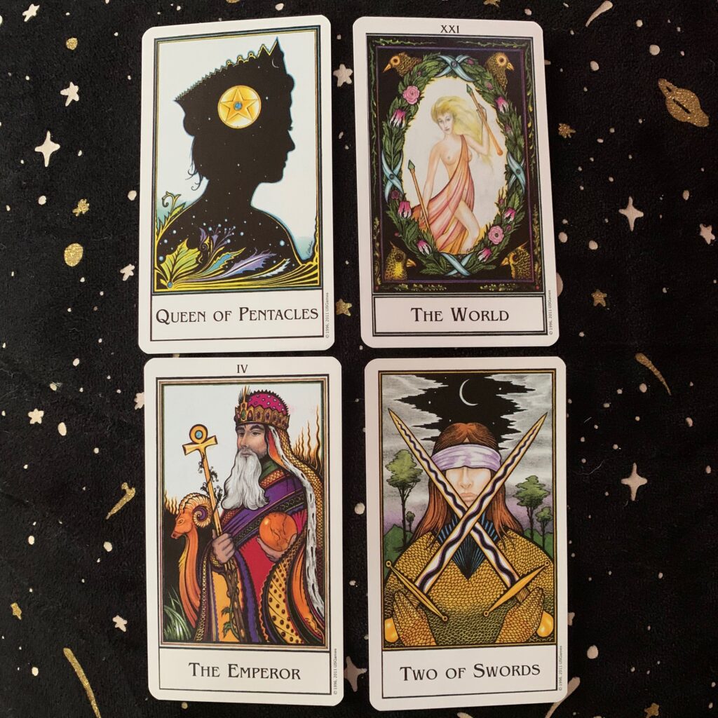 Queen of Pentacles, The World, The Emperor, and Two of Swords from The New Palladini Tarot